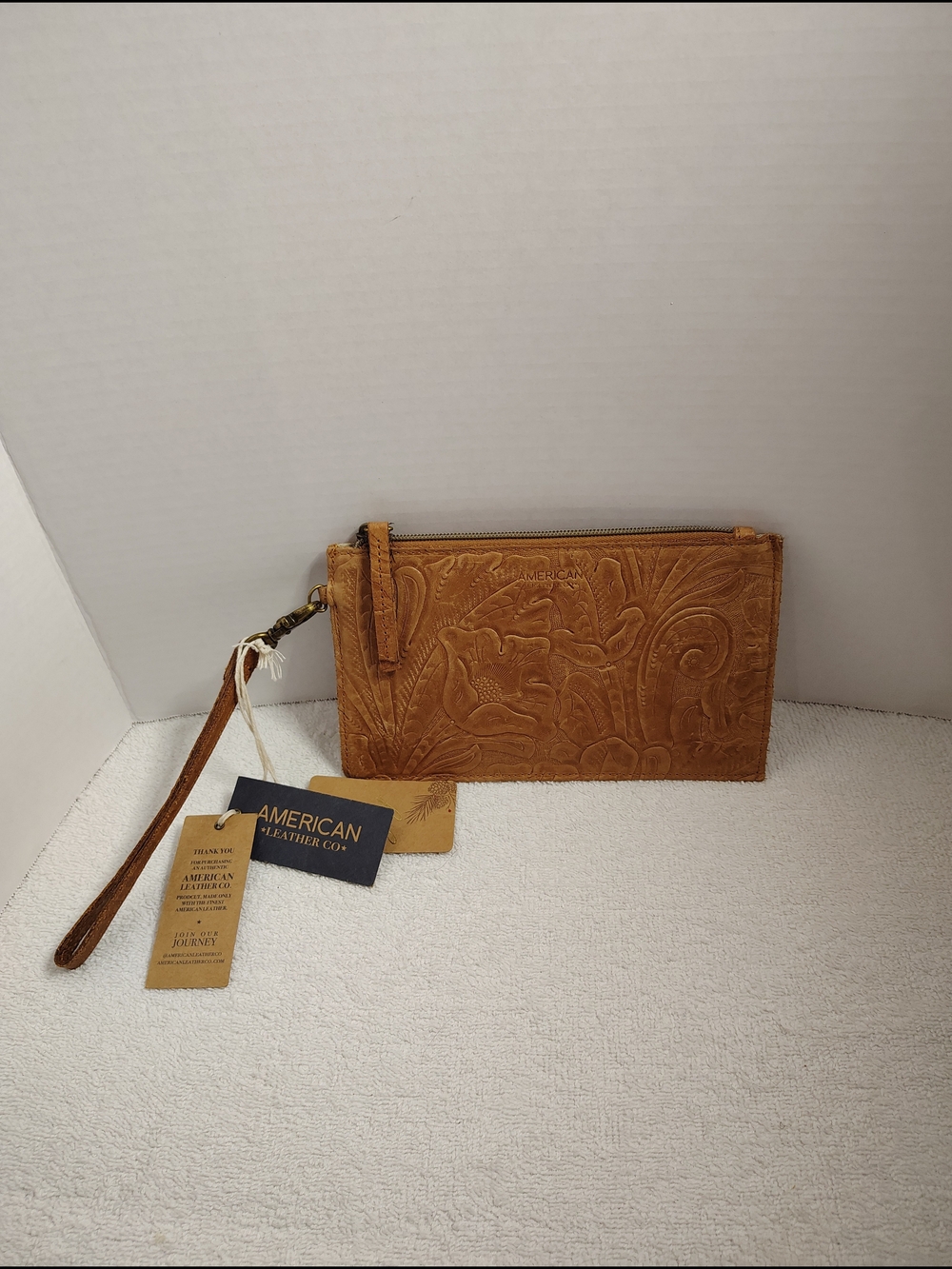 American Leather Co. Embossed Tan Leather Wristlet Clutch